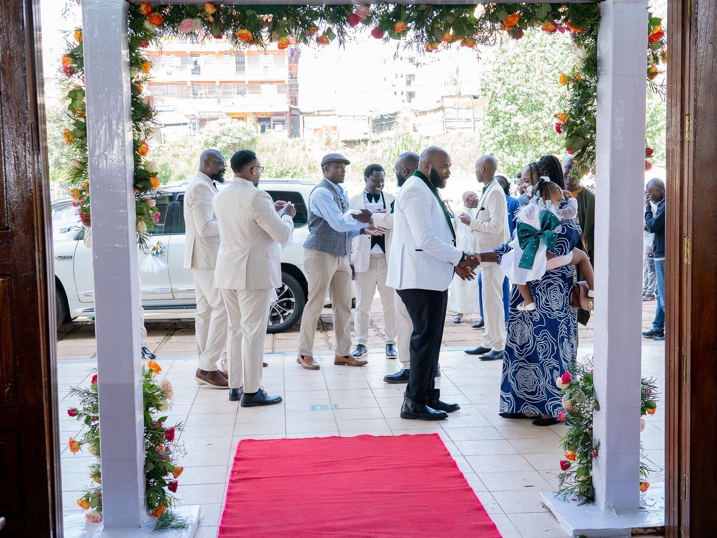 Guests at the church entrance on the wedding day