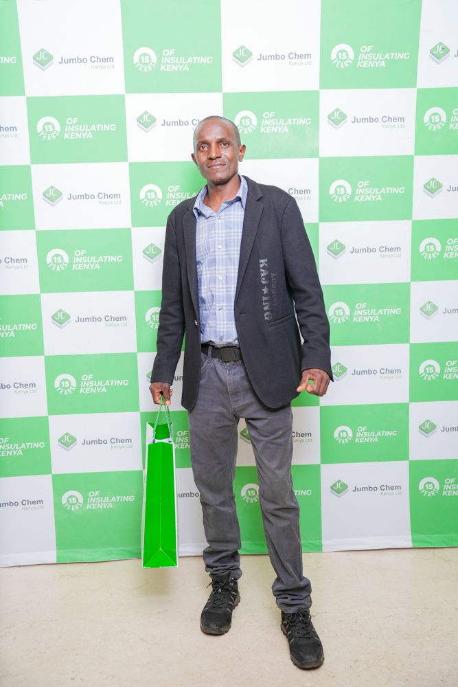 Guest at the branded Jumbo Chem @15 backdrop