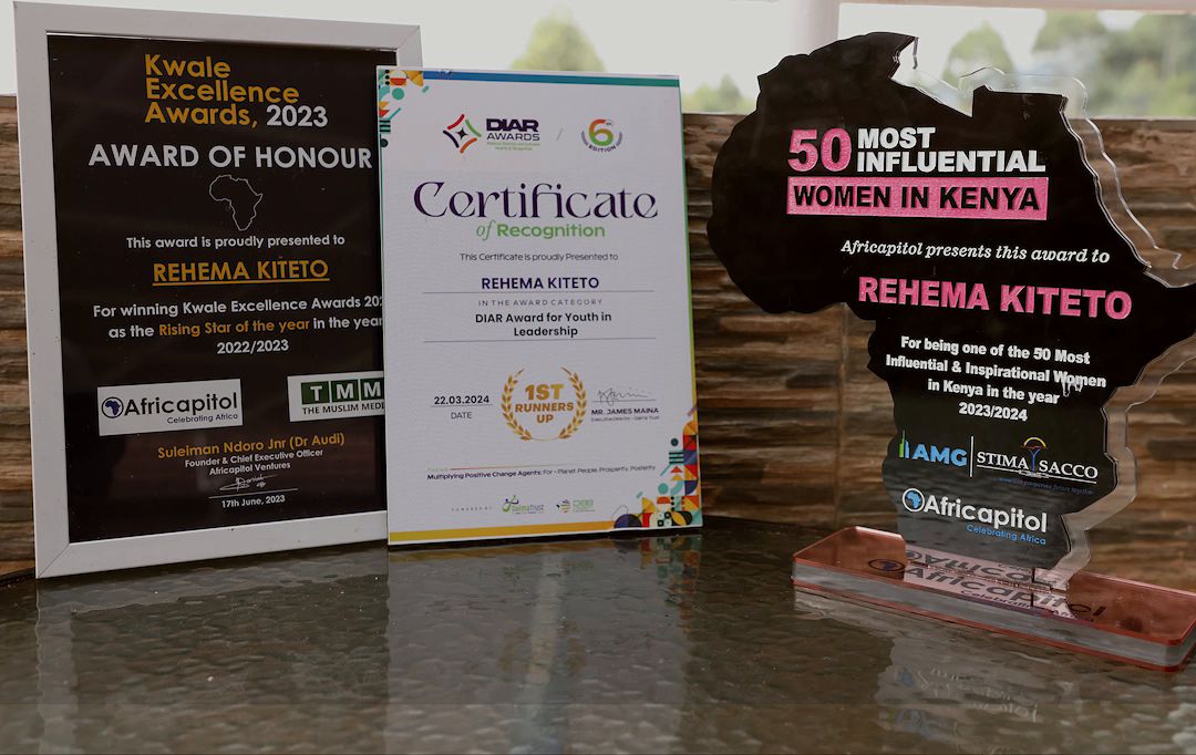 Awards and certificates including 50 Most Influential Women in Kenya