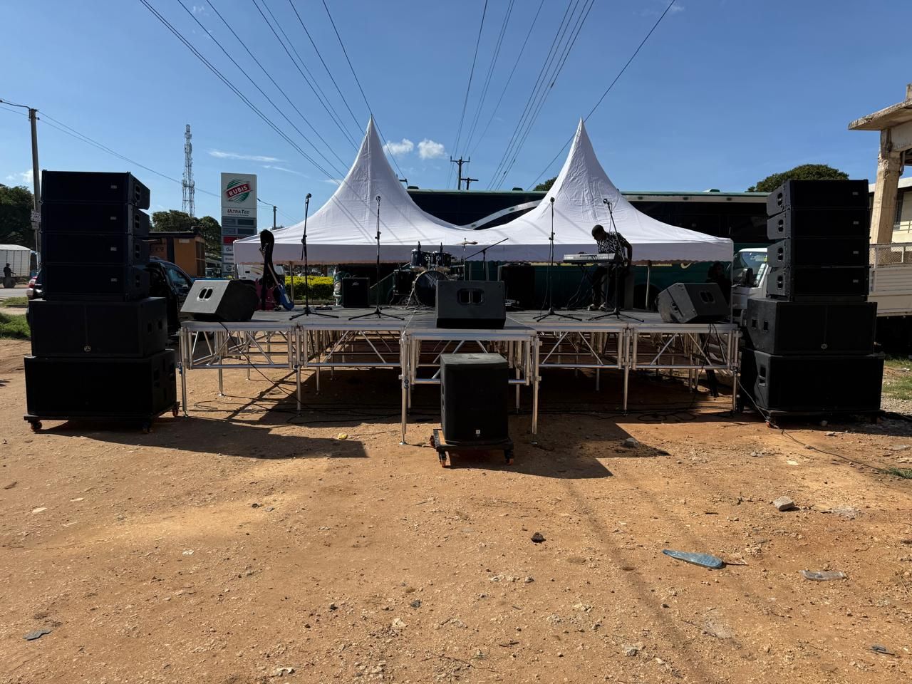 Outdoor stage with line-array PA, monitors and backline