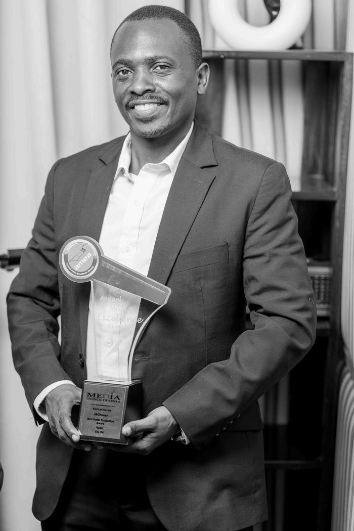 Black and white award portrait in the TWR studio