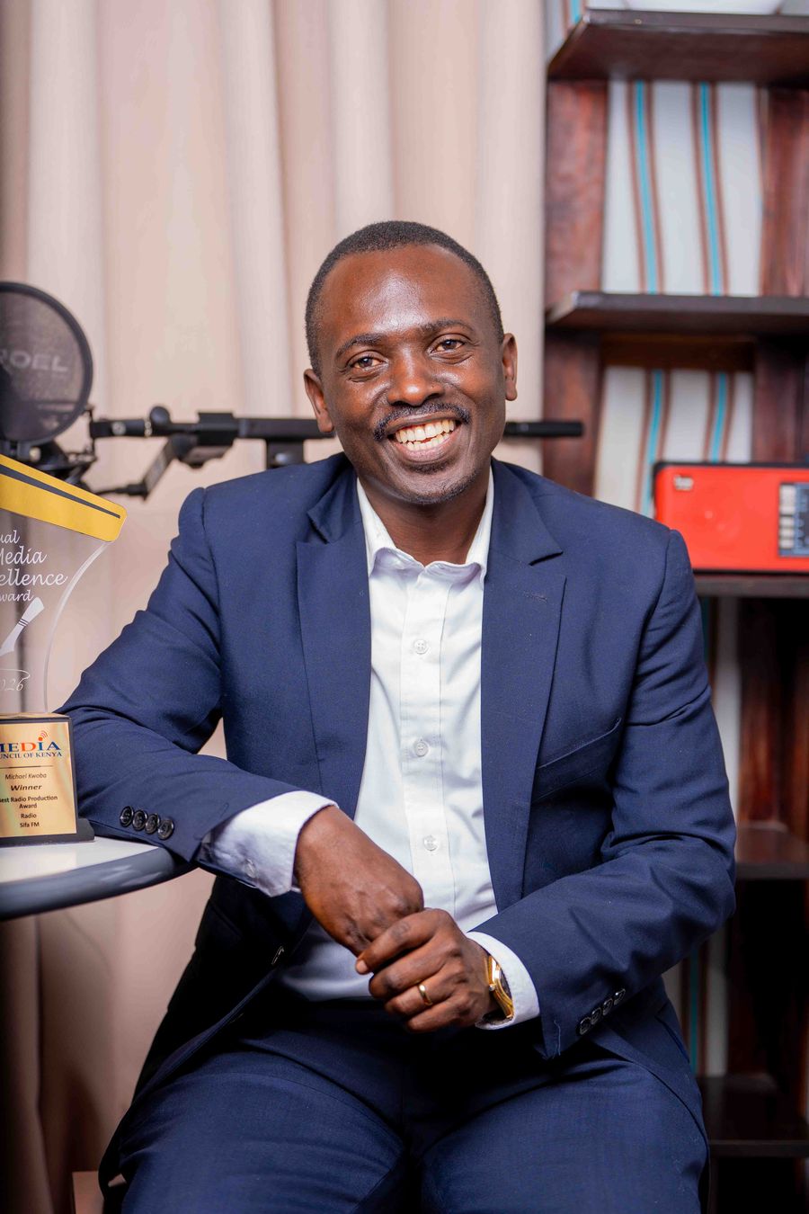 A TWR Kenya presenter photographed in the studio